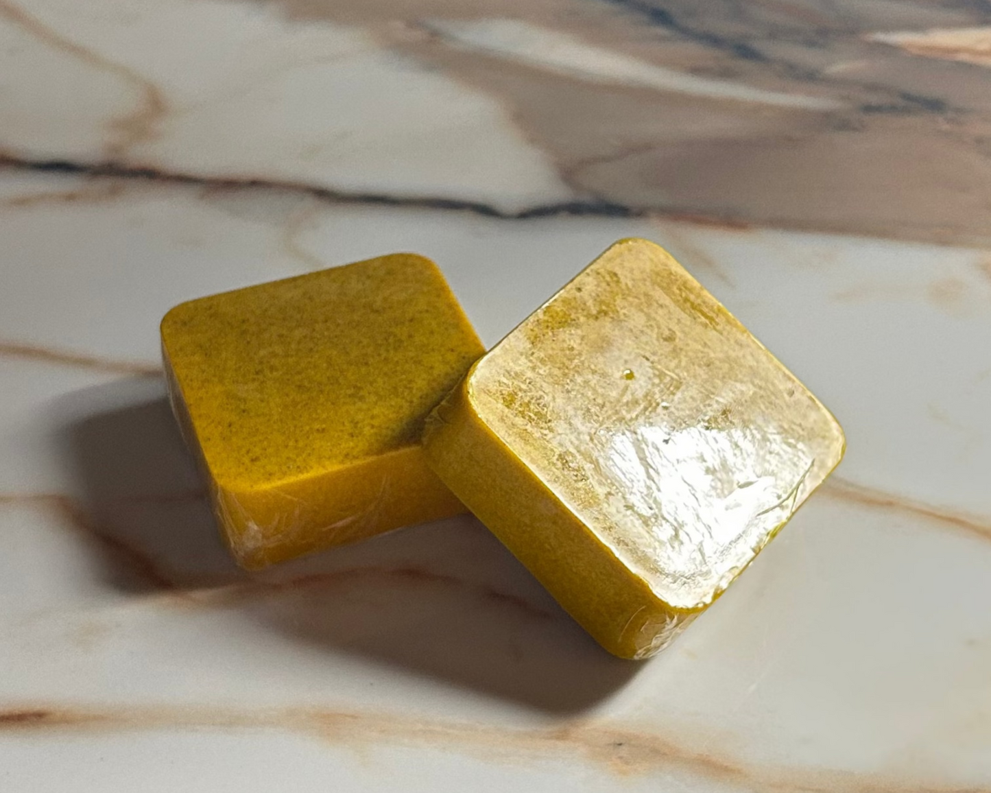 Square bars of turmeric soap