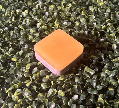 Square bar of cinnamon and honey soap that has two distinctive layers
